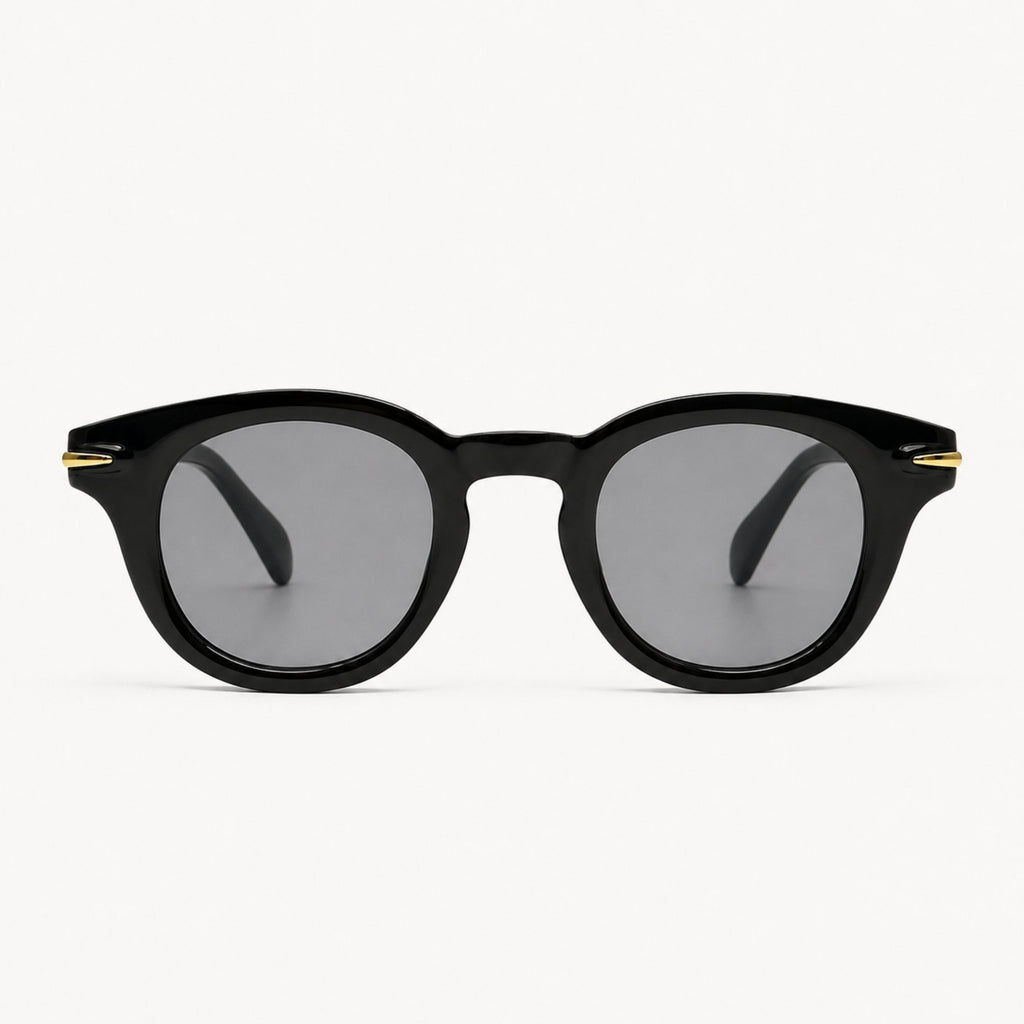 Lunettes de soleil Niko Midnight noires Osour Eyewear avec monture ronde noire, détails dorés et verres noirs