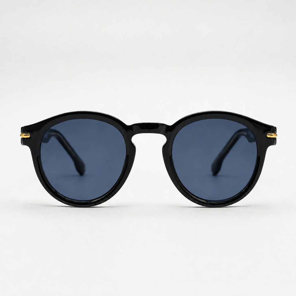 Lunettes de soleil Smith bleues Osour Eyewear avec monture ronde, détails dorés sur les branches et verres bleu foncé