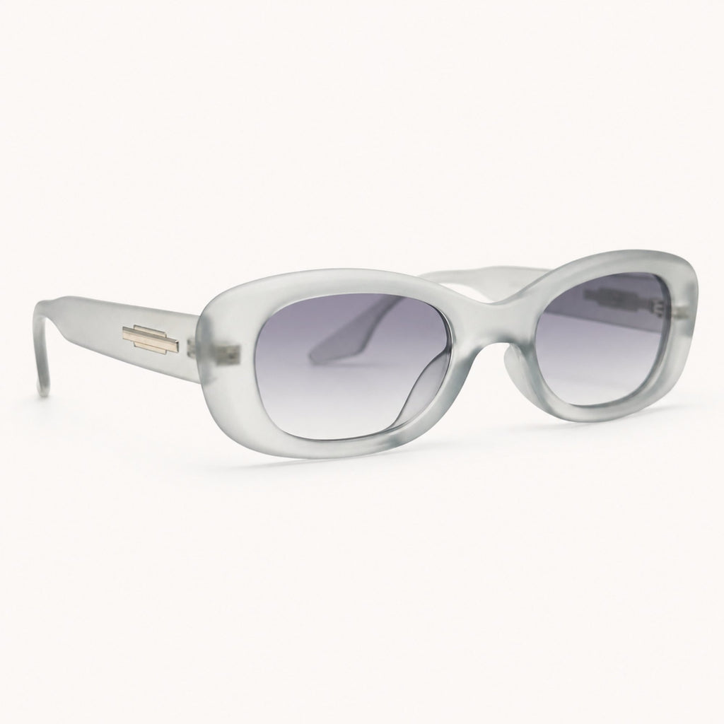 Lunettes de soleil Osour Alba Grey à monture ovale gris translucide avec verres gris dégradés, vue de profil