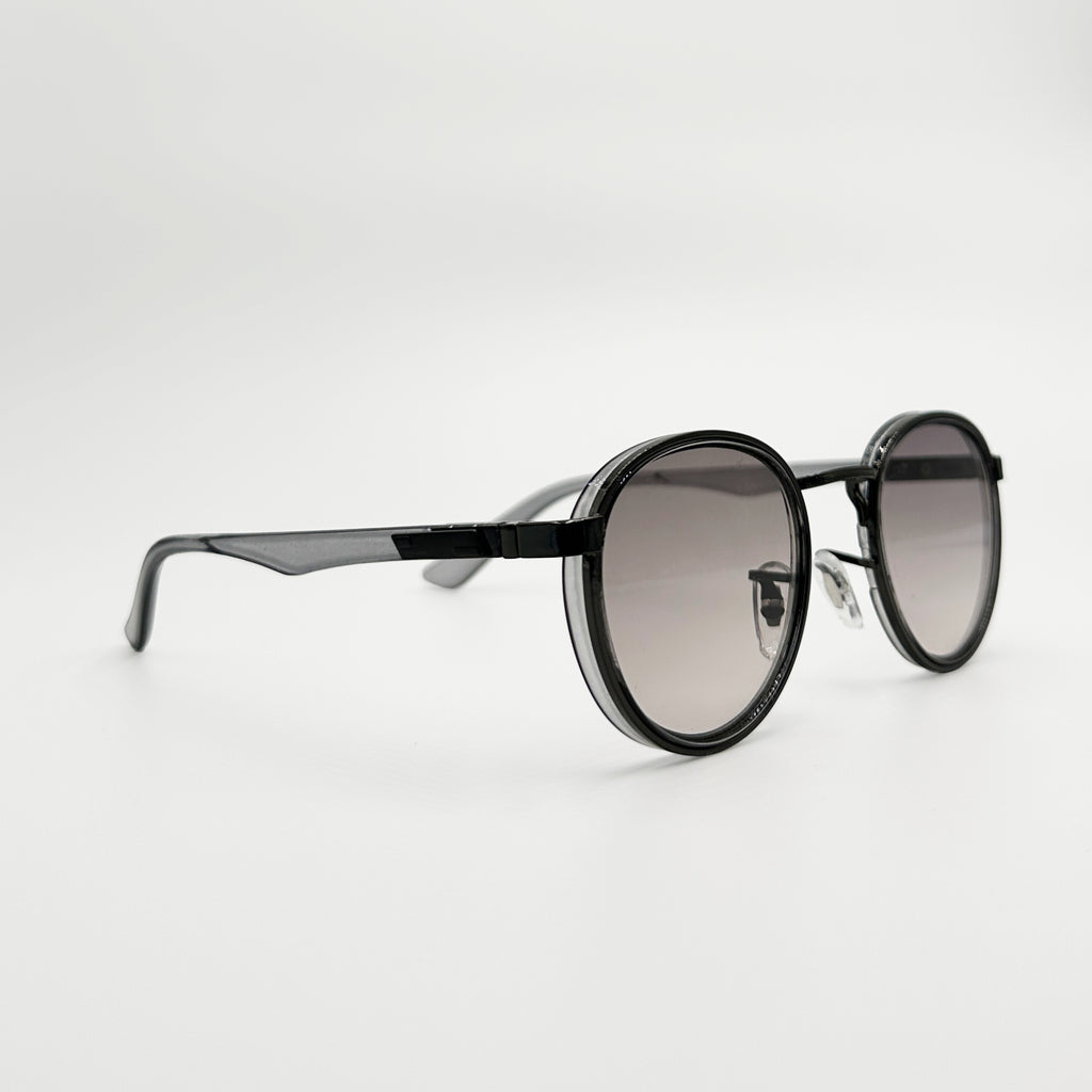 Lunettes de soleil rondes noires La Azura vue de profil avec verres gris fumés