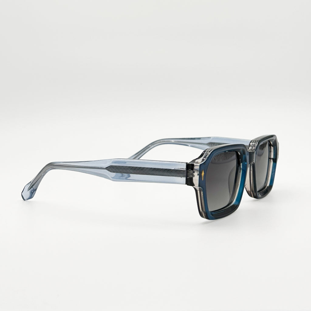 Lunettes de soleil rectangulaires bleues La Enzo vue de profil avec verres noirs dégradés
