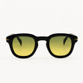 Lunettes de soleil rondes noires La Niko avec verres jaunes vue de face